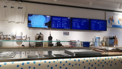 Ice cream store with digital signage screens